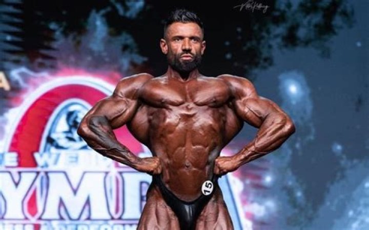 Who was Neil Currey, bodybuilder and former Mr Olympia contestant?