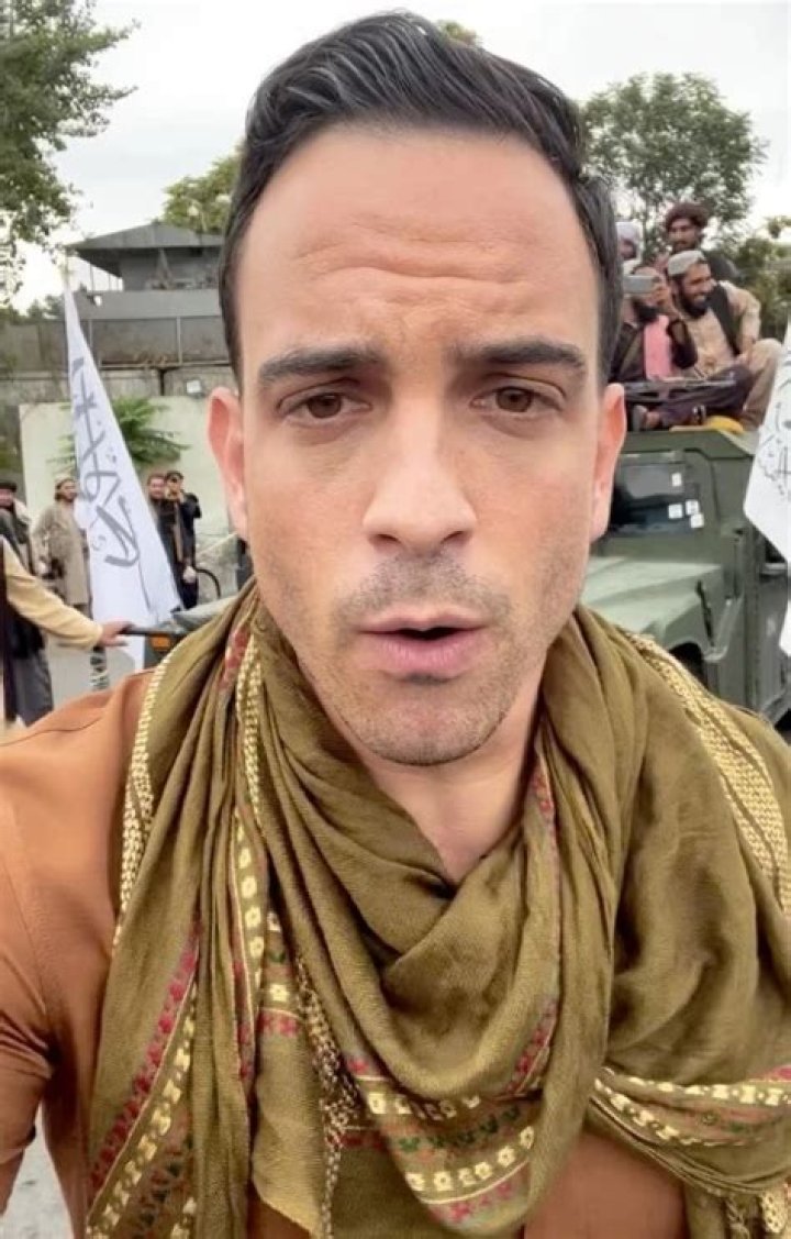 Why does Trey Yingst wear a scarf?